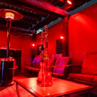 a living room with red lighting