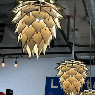 three lamps hanging from the ceiling