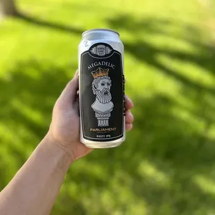 a person holding a can