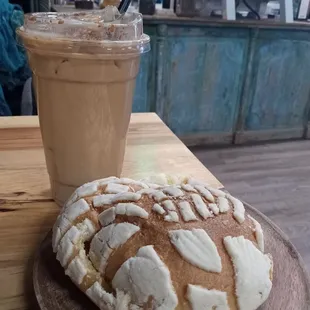 Iced dirty chai + concha ($8.75)
