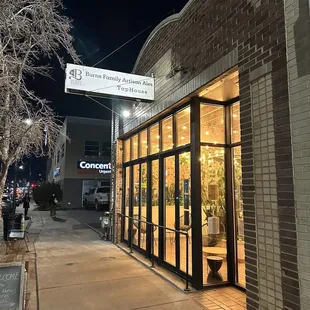 the front of a building at night