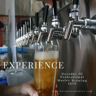 a beer being poured from a tap
