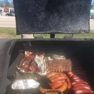 Delicious sausage, ribs, boudin, and moist brisket