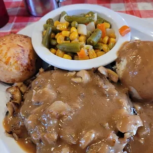 a plate of food with gravy