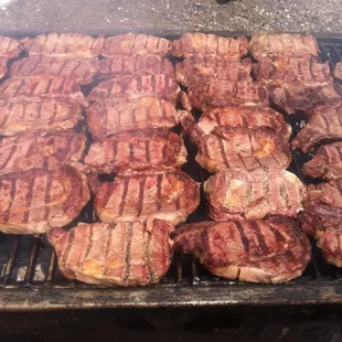 Angus Ribeyes grilled over Mesquite