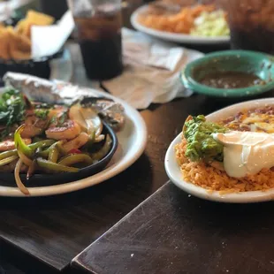 Shrimp fajitas and side of rice and beans