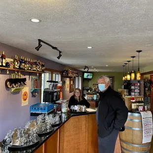 a man standing at the bar