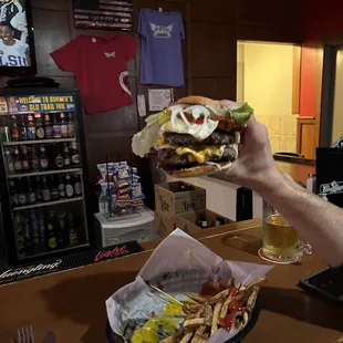 Double burger loaded with bacon with fresh cut fries