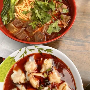 Beef noodle soup, wonton in spicy sauce.