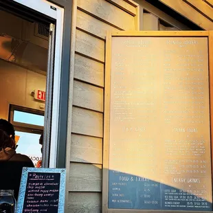 a menu on the outside of a building