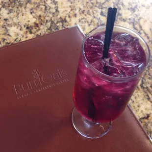 Cherry vodka, blueberry juice &amp; sprite at the bar.