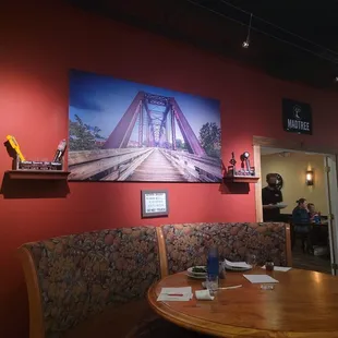 a dining area with red walls