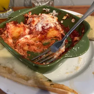 Baked manicotti. Yummy and perfect size.