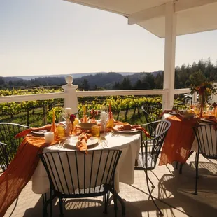 a table setting on a patio