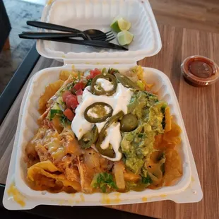 Shredded chicken nachos with guac