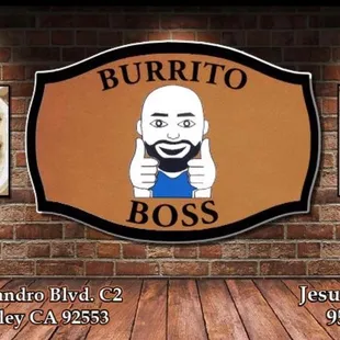a brick wall with a picture of a man
