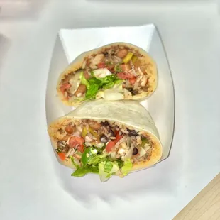 two burritos on a plate