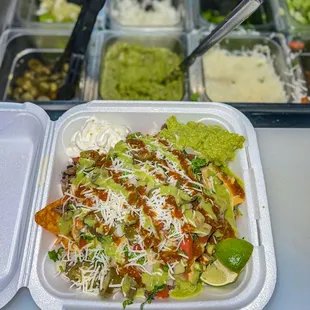 a salad in a plastic container