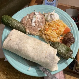 Carnitas burrito dinner plain and chilis toreados