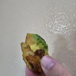Fried Avocado with hair stuck in it. Came out of package like this.