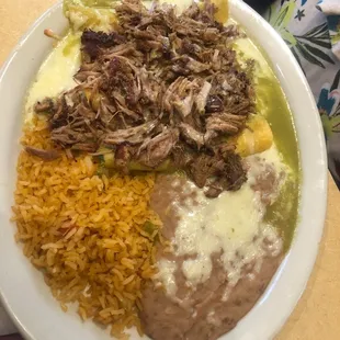 Enchiladas suizas.  Cheese enchiladas covered in cheese &amp; shredded pork!