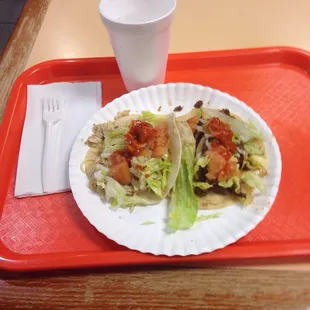 Chicken fajita taco and steak fajita taco (requested without bell pepper)