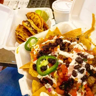 nachos in a styrofoam container