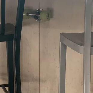 Cute purse hook made out of skateboard wheels