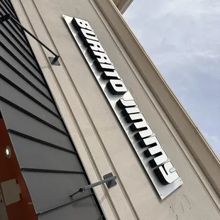 a sign on the side of a building