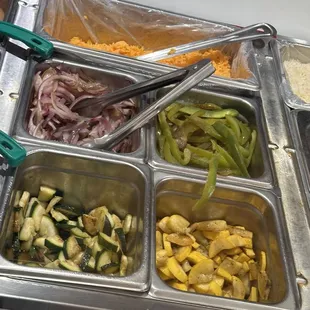 a variety of vegetables in a buffet