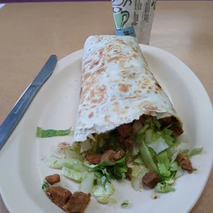 Cross-section of my steak burrito ordered without cheese or sour cream. Add onions.