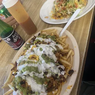 Carne asada fries, rolled tacos