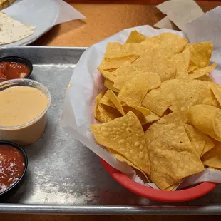 Chips, queso, and salsa. The salsa is delicious!