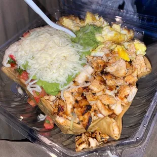 Wowwww massive grilled chicken and soft scramble egg taco salad.