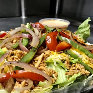 a salad in a plastic container