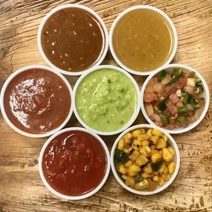 a variety of condiments on a cutting board