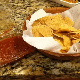 Chips and salsa. Chips tasted a little stale, but the salsa was yummy yet REALLY hot!!