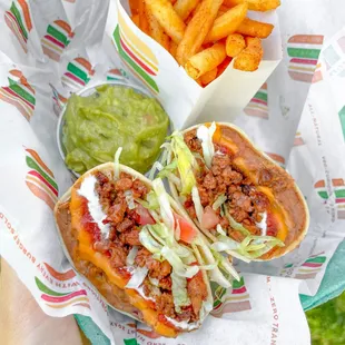 Beefy Deluxe Burrito - featuring 100% plant-based ingredients. Guacamole and picante seasoned french fries.