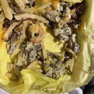 I was eating carne asada fries with shrimp and found it halfway through