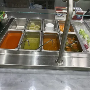 Selection of salsas - they have some already portioned out and fresh cut limes and radishes as well !!