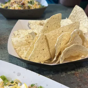 Yummy chips &amp; sauces available on tables