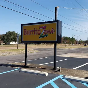 a sign for burrito zone