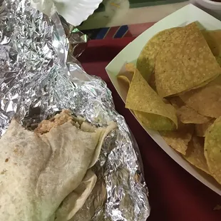 steak burrito with cheese rice beans guacamole sour cream
