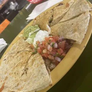 Beef Quesadillas with grilled peppers and onions.