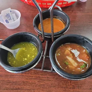 That red pink salsa is the spicier