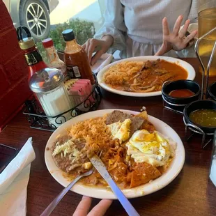 Chilaquiles with meat and eggs
