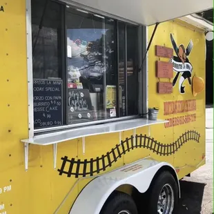 a yellow food truck