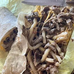 Burrito with carne asada and fries and cheese