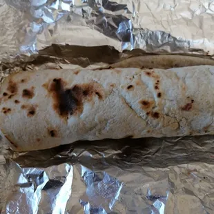 a burrito wrapped in foil
