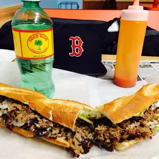 a bottle of water and a sandwich